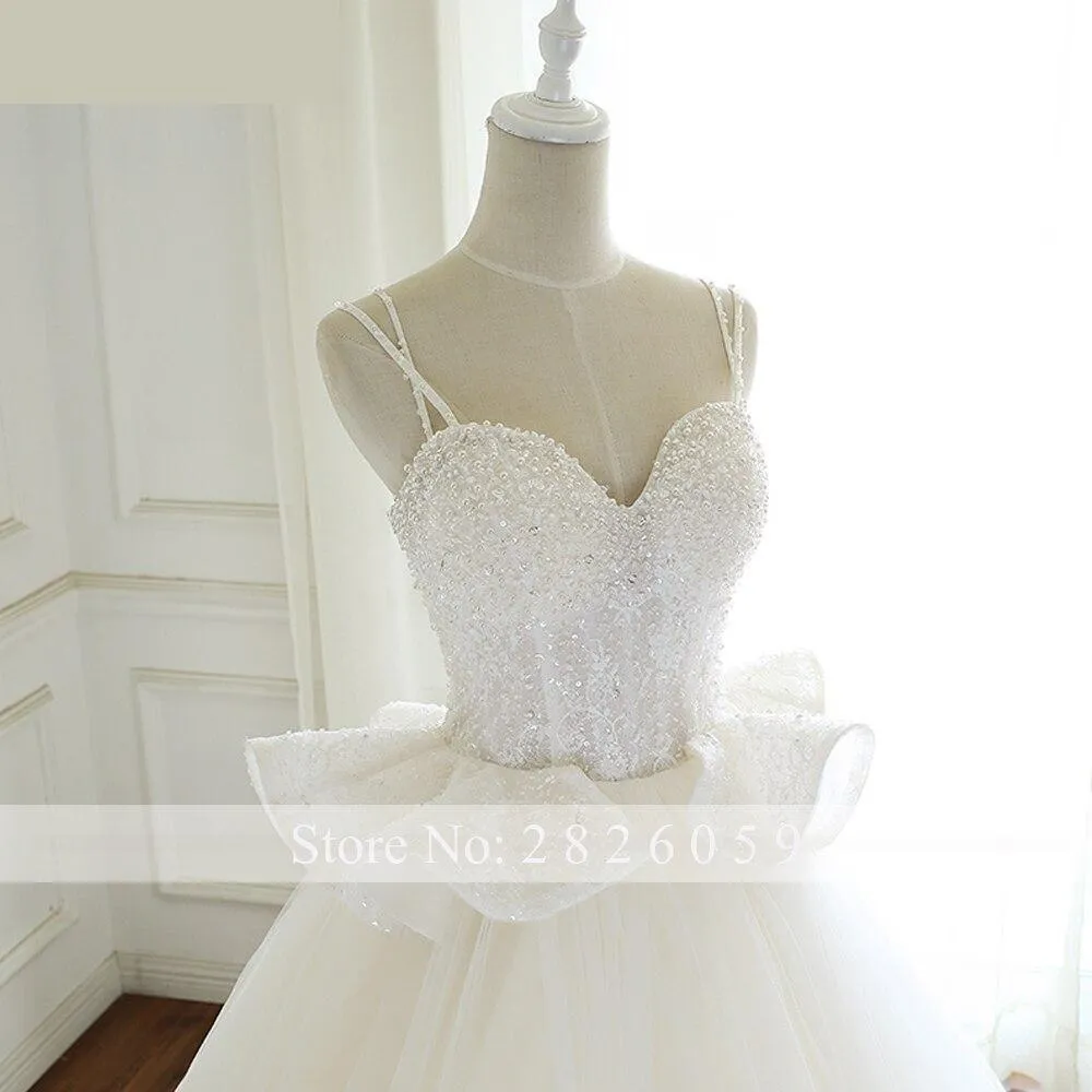 A-Line Sleeveless Ruffled Floor Length Wedding Dresses with Spaghetti Straps